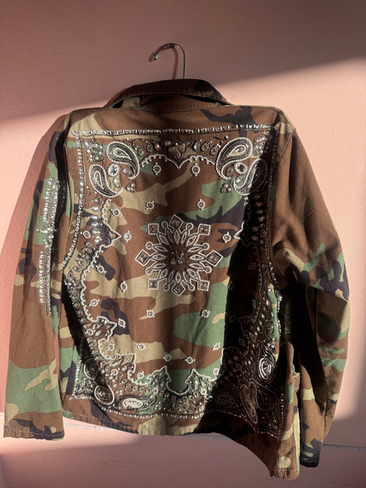 Women’s camouflage blazer embellished with high-quality stones.